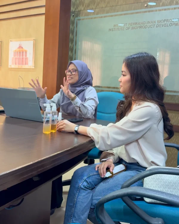 Meeting at UTM's Institute of Bioproduct Development, with formula samples on the table